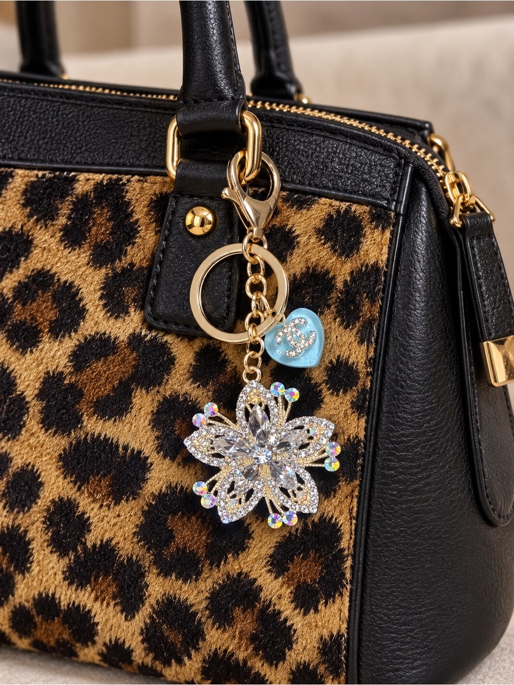 Crystal Flower Bag Charm Keychain in Gold with Blue Heart